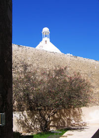 Low angle view of built structure against sky