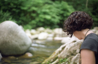 Rear view of woman in water