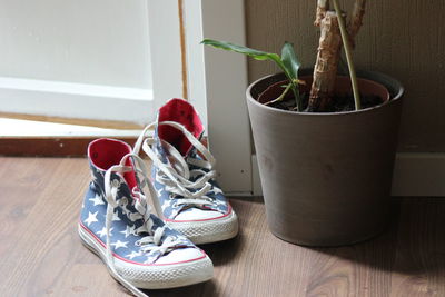 Close-up of shoes on table