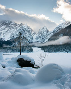 Snow covered mountains against sky