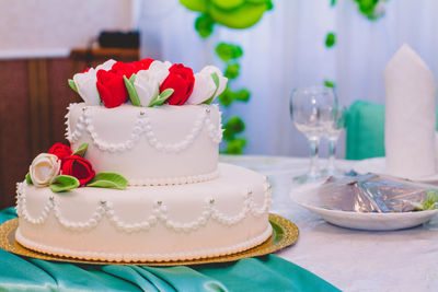 Close-up of cake served on table