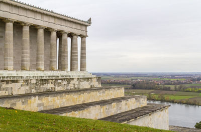 View of historical building against cloudy sky