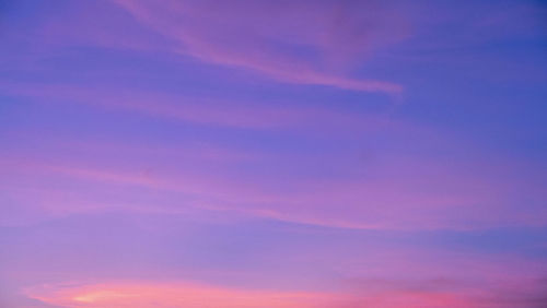 Low angle view of dramatic sky during sunset