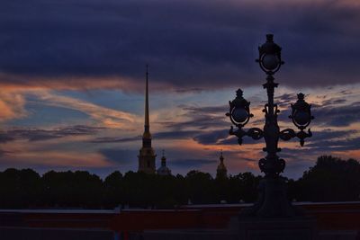 Low angle view of cloudy sky at sunset