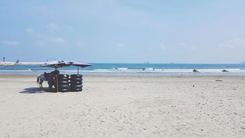 Scenic view of beach against sky