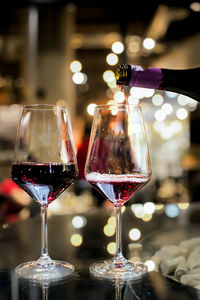 Close-up of wineglass on table