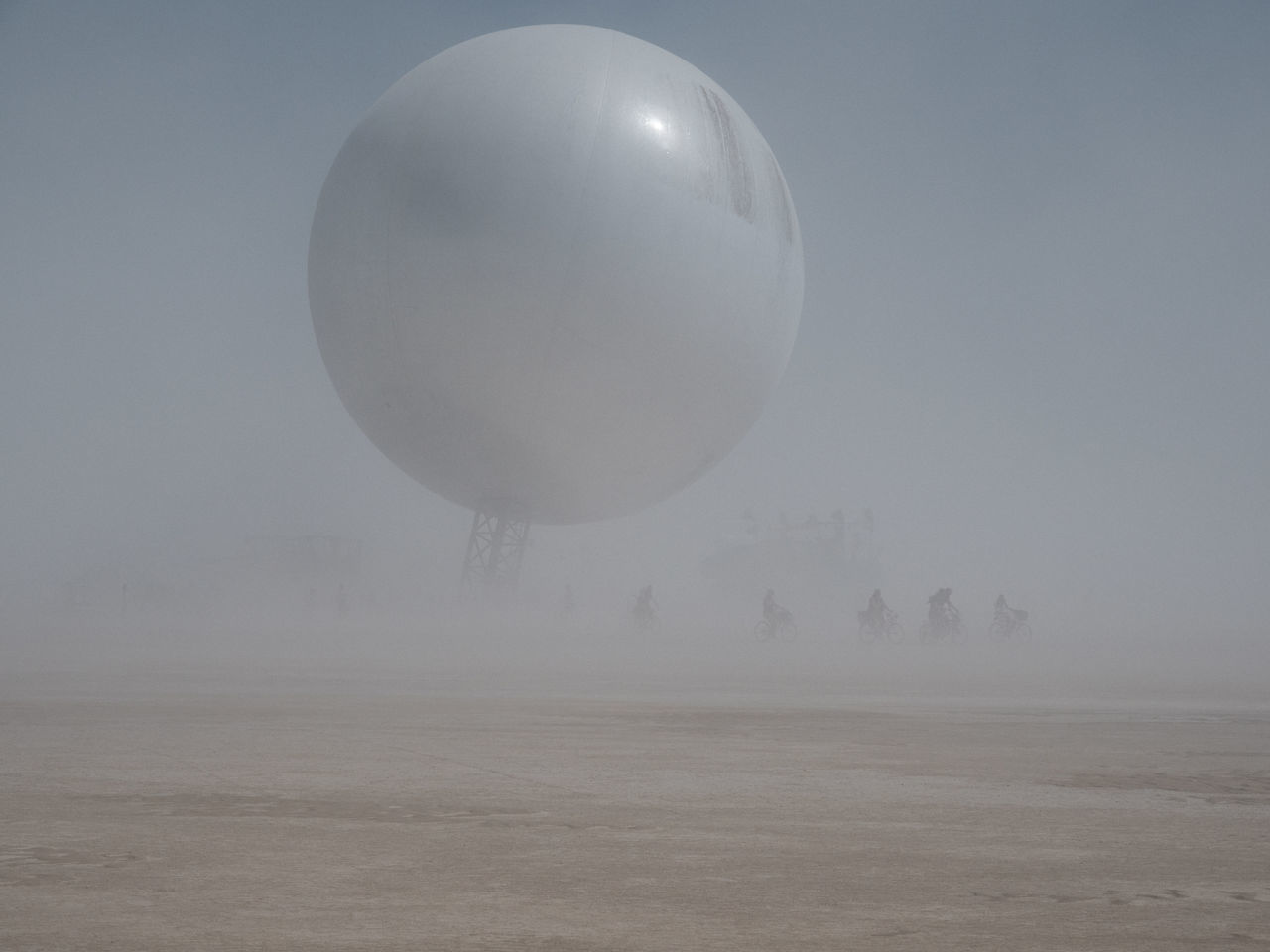 fog, no people, beauty in nature, landscape, scenics - nature, tranquil scene, balloon, nature, environment, sky, tranquility, non-urban scene, tree, cold temperature, day, winter, outdoors, land, field