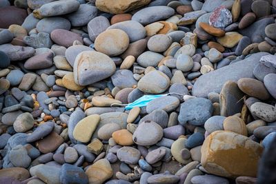 Full frame shot of pebbles on beach