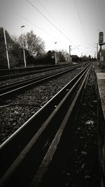 Railroad track against sky