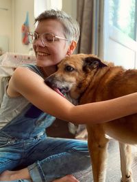 Woman with dog at home