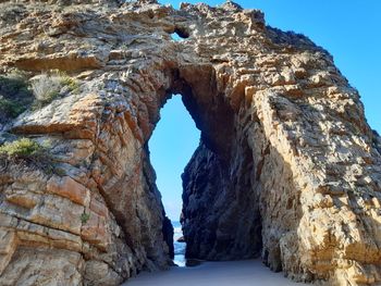 View of rock formation in sea