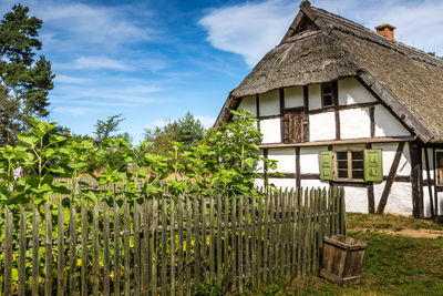 House on field against sky