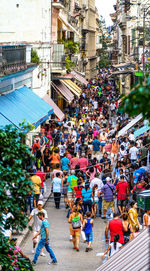 High angle view of people walking on street