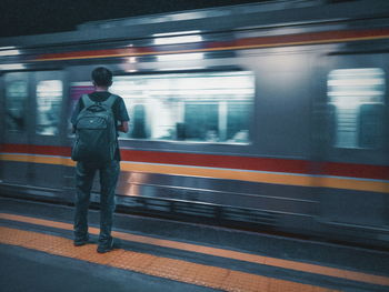 Blurred motion of train at railroad station platform