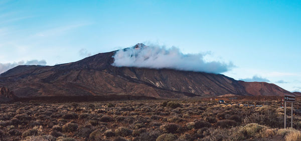 Scenic view of volcanic landscape against sky