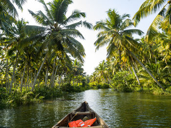 Boat in lake against sky