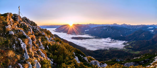 Scenic view of mountains against sky during sunset