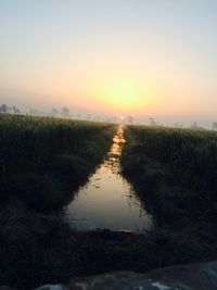 Scenic view of landscape against sky during sunset