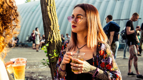 Panoramic view of woman drinking glass