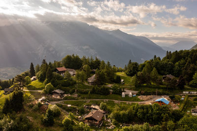 High angle view of trees and mountains against sky