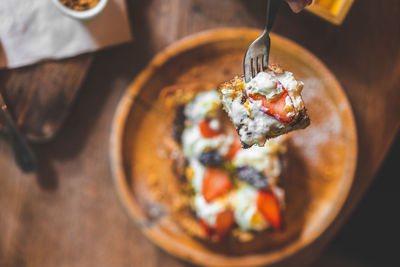 High angle view of ice cream in bowl on table