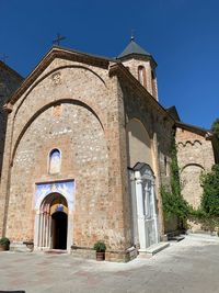 Historic building against clear blue sky