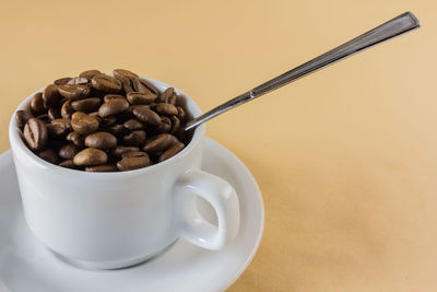 Close-up of coffee cup on table