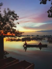 Scenic view of swimming pool against sky during sunset