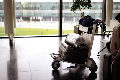 Rear view of man working at airport