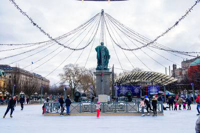 Group of people in front of building in winter