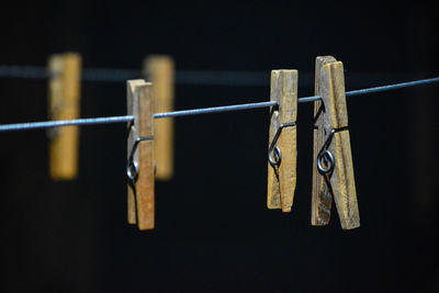 Close-up of clothes hanging on clothesline