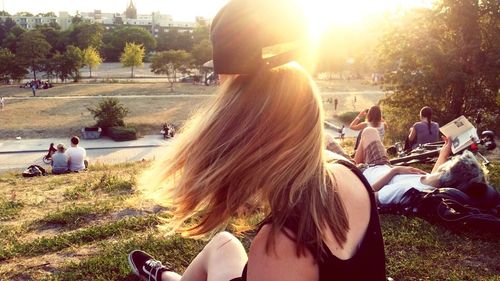 People relaxing in park