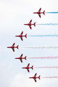 Low angle view of red wall