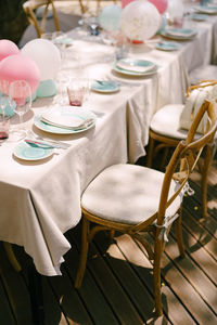Empty chairs and table in restaurant