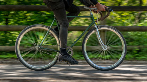 Low section of people riding bicycle