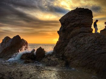 Scenic view of sea at sunset