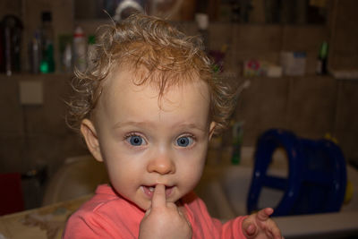 Portrait of cute baby at home