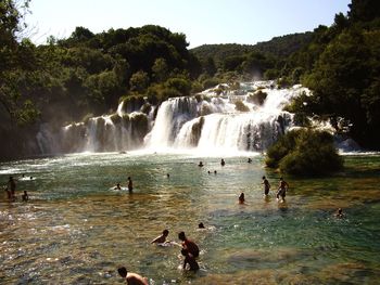 Scenic view of waterfall against clear sky