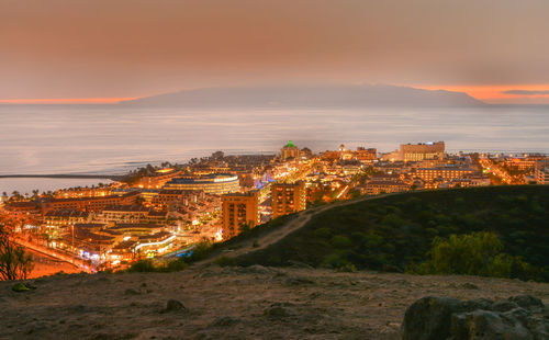 Illuminated cityscape at night