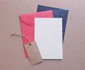 High angle view of paper in box on table
