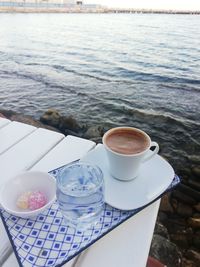 High angle view of coffee cup on table