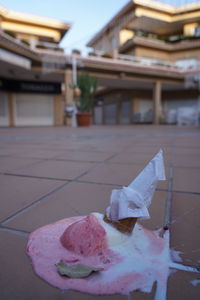 Close-up of ice cream against building