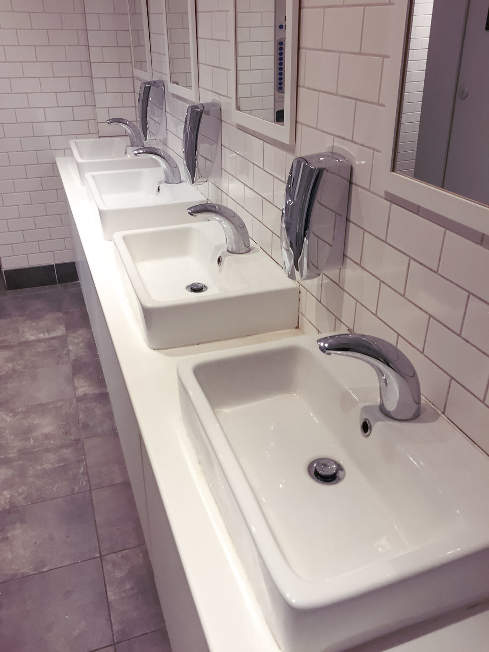 HIGH ANGLE VIEW OF BATHROOM AND WHITE WALL IN ROOM