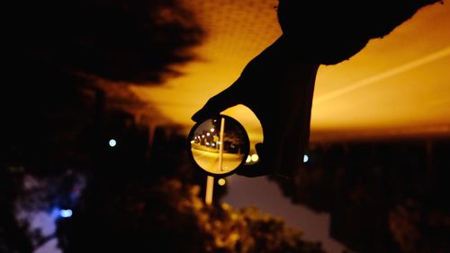 Close-up of illuminated lights at night