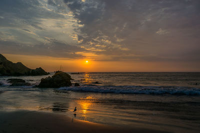 Scenic view of sunset over sea