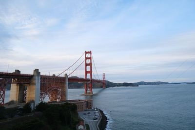 View of suspension bridge over sea