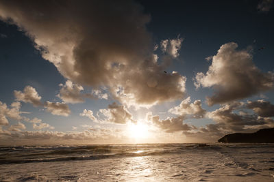 Scenic view of sea against sky during sunset