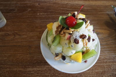 Close-up of fruits served on table