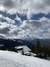 Scenic view of snowcapped mountains against sky