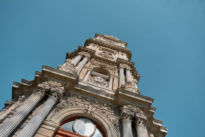 Low angle view of a building against blue sky